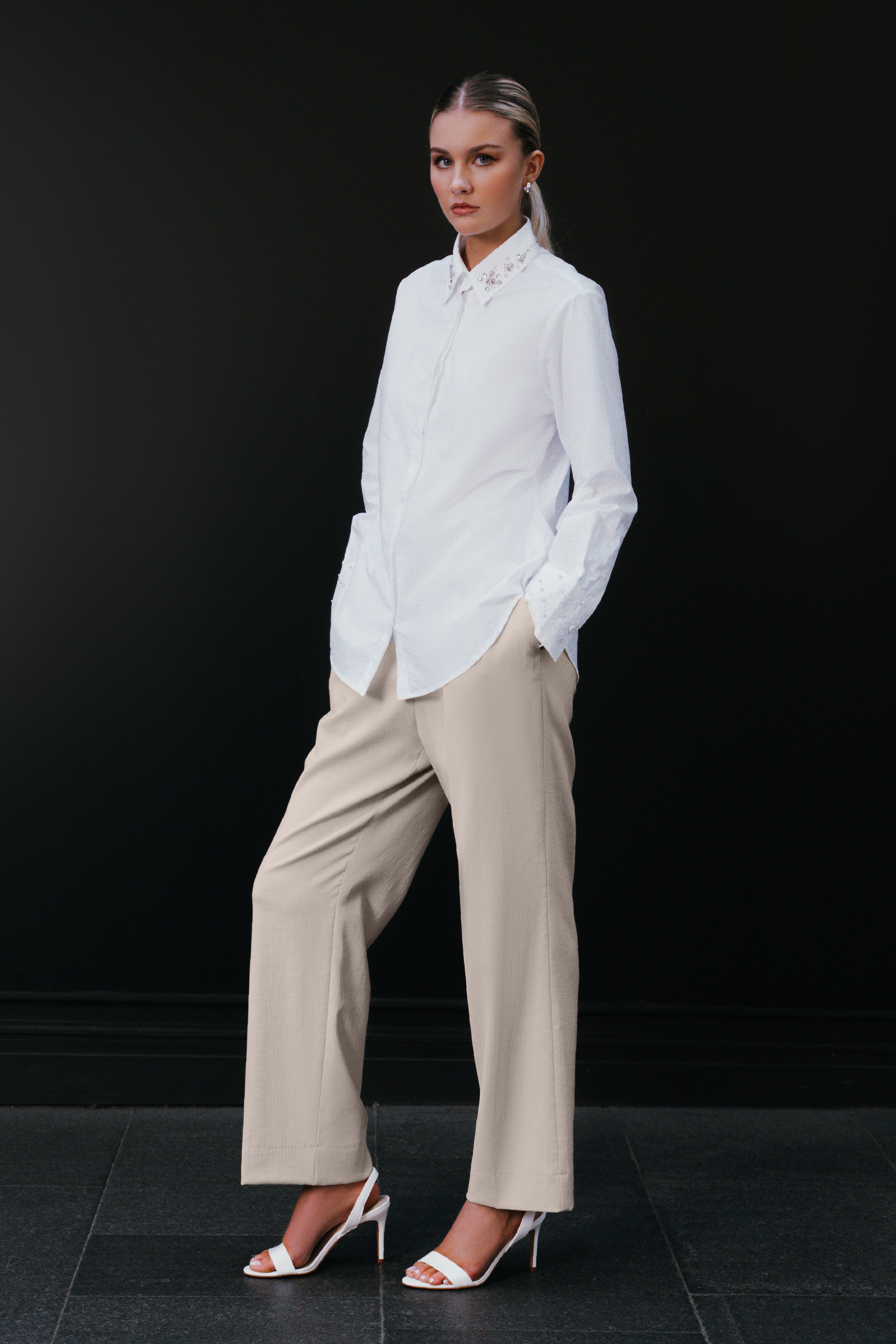 Beige pants with white shirt on sale